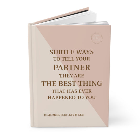 Book titled 'Subtle Ways to Tell Your Partner They Are the Best Thing That Has Ever Happened to You' on a white background